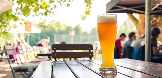 pint sitting on a table in a beer garden